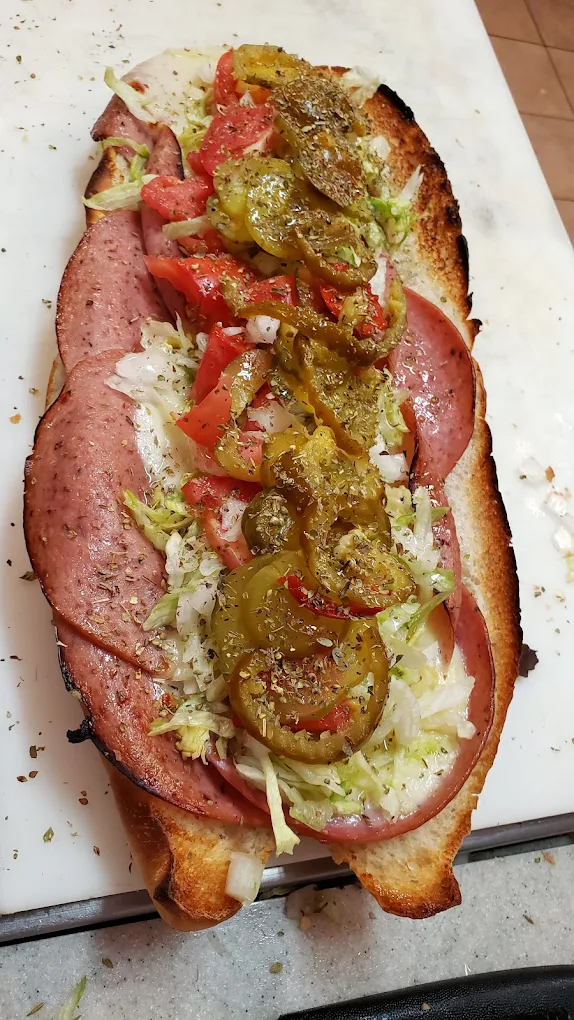 The Cooked Hot Italian open-faced on the cutting board